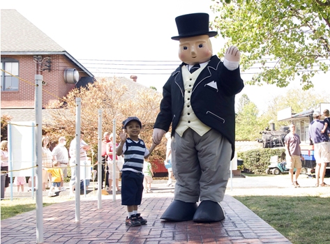 Sir Topham Hatt greets a young fan